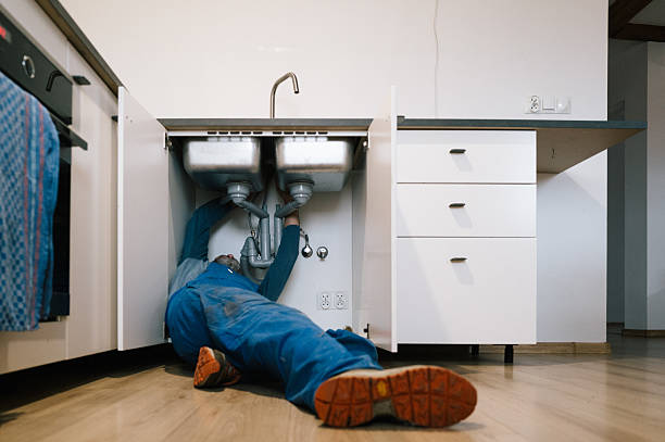 Professional Emergency Plumber technician working in Hallsville, MO